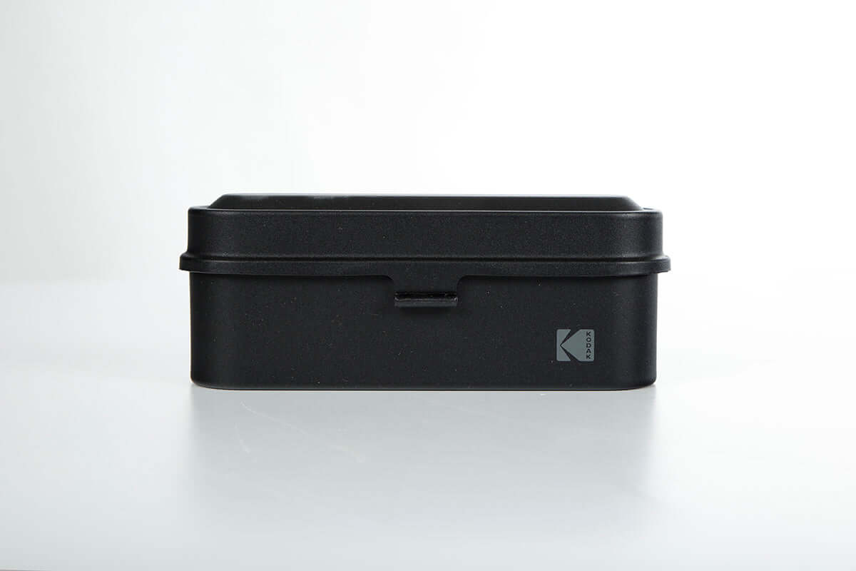 Kodak 135 film case in the color black.