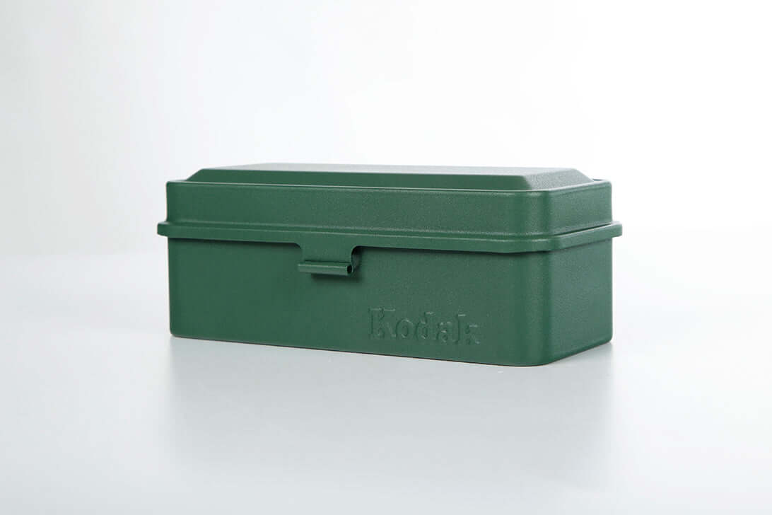 Kodak 135/120 film case in the color green.