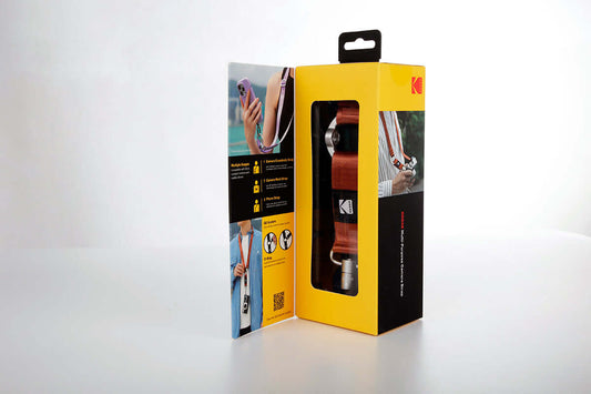 Kodak Multi-Purpose Camera Strap (Burgundy) in packaging, showcasing adjustable design and Quick-Detach System.