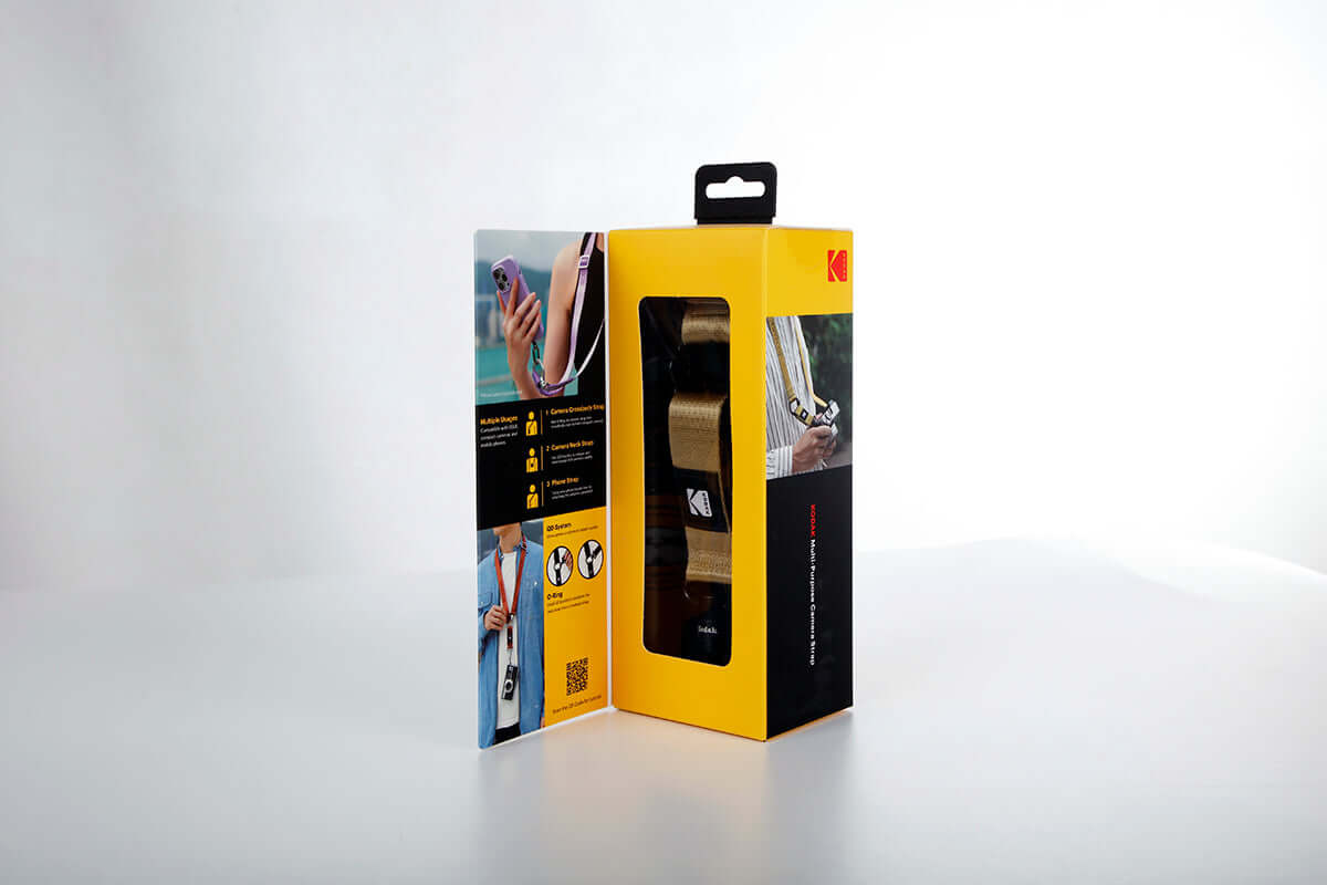 Kodak Multi-Purpose Camera Strap (Khaki) packaging with instructions and product features displayed.