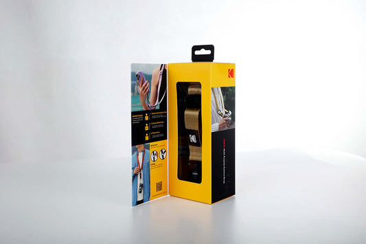 Kodak Multi-Purpose Camera Strap (Khaki) packaging with instructions and product features displayed.