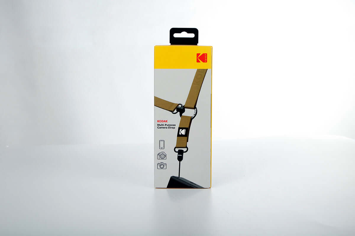 Kodak Multi-Purpose Camera Strap (Khaki) packaging image showcasing features and design.