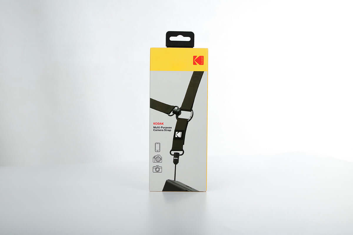 Kodak Multi-Purpose Camera Strap (Olive) packaging showing adjustable features and Quick-Detach System.