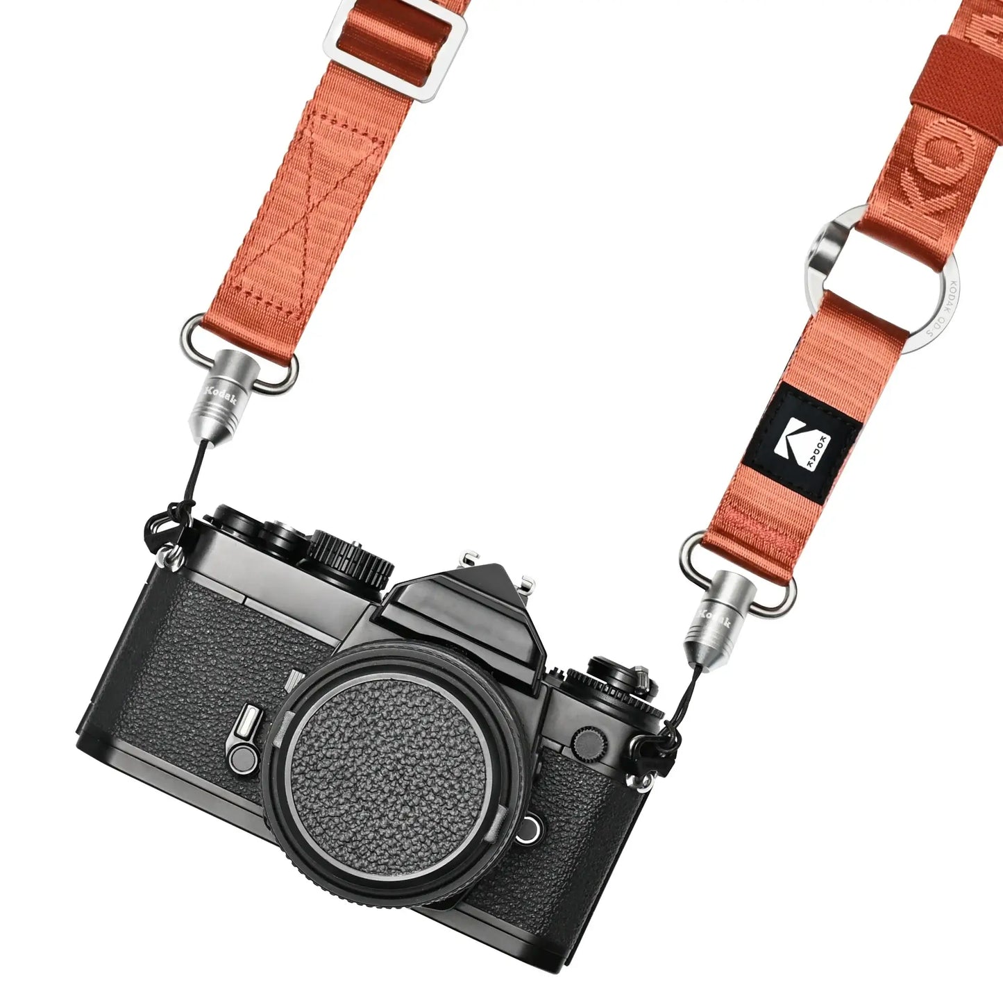 Kodak Multi-Purpose Camera Strap (Burgundy) attached to an SLR camera for versatile carrying.