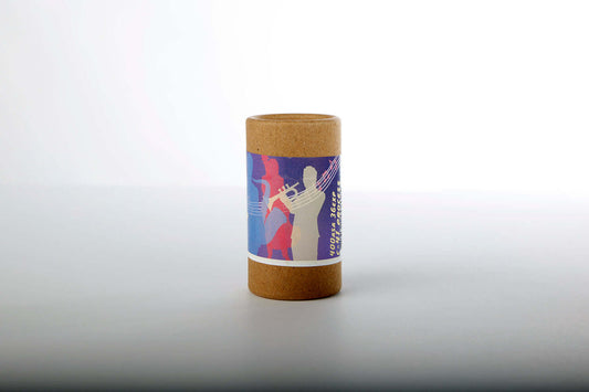 Street Candy Street Savvy 400 Color Negative Film roll in stylish packaging on a light background.