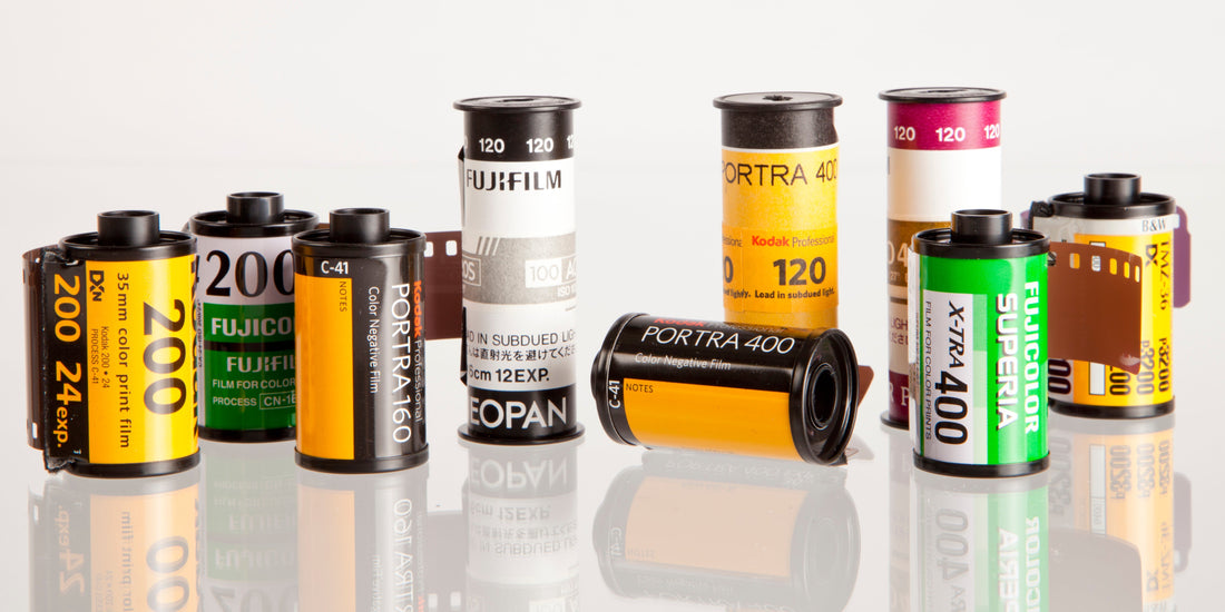 Collection of 35mm and 120 film rolls showcasing options for 35mm vs. 120 Film comparison.