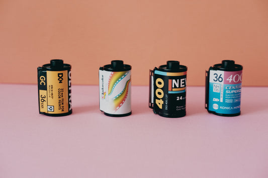 Understanding Film Types: different film rolls for color, B&W, and slide film in photography.