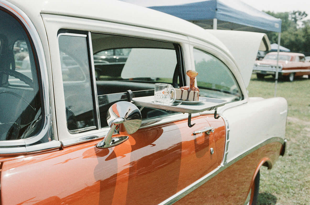 Street Candy Psychedelic Street 400 Color Negative Film (35mm Roll, 36 Exposures) photo of car with tray and snacks.