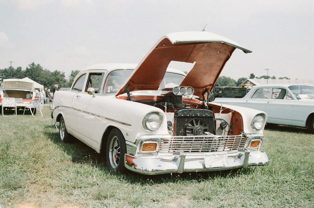 Street Candy Psychedelic Street 400 Color Negative Film (35mm Roll, 36 Exposures) showcased on a classic car.