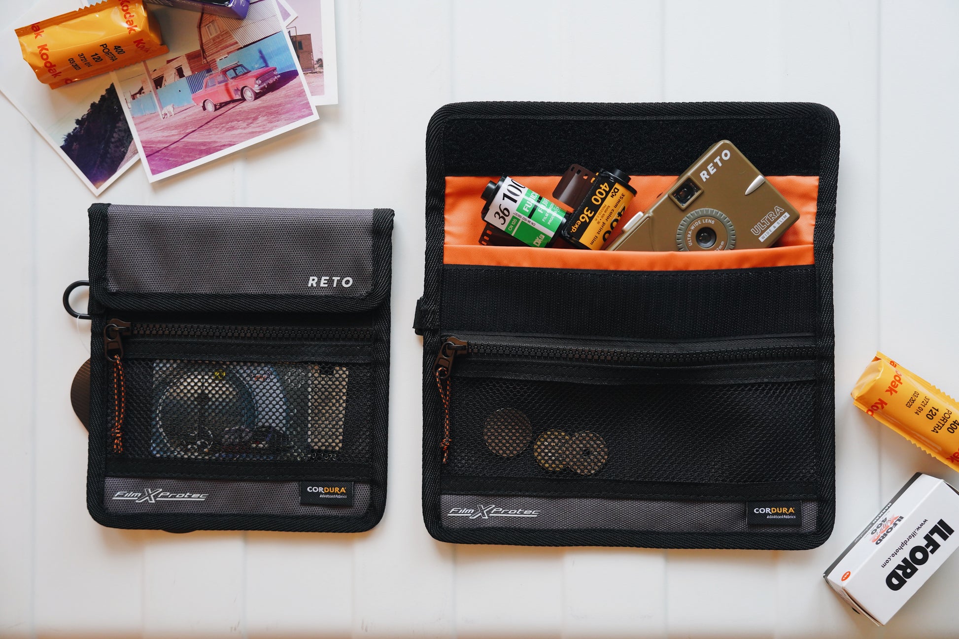 RETO Film X-Protec Bag (Small) displayed with film rolls and accessories on a flat surface.