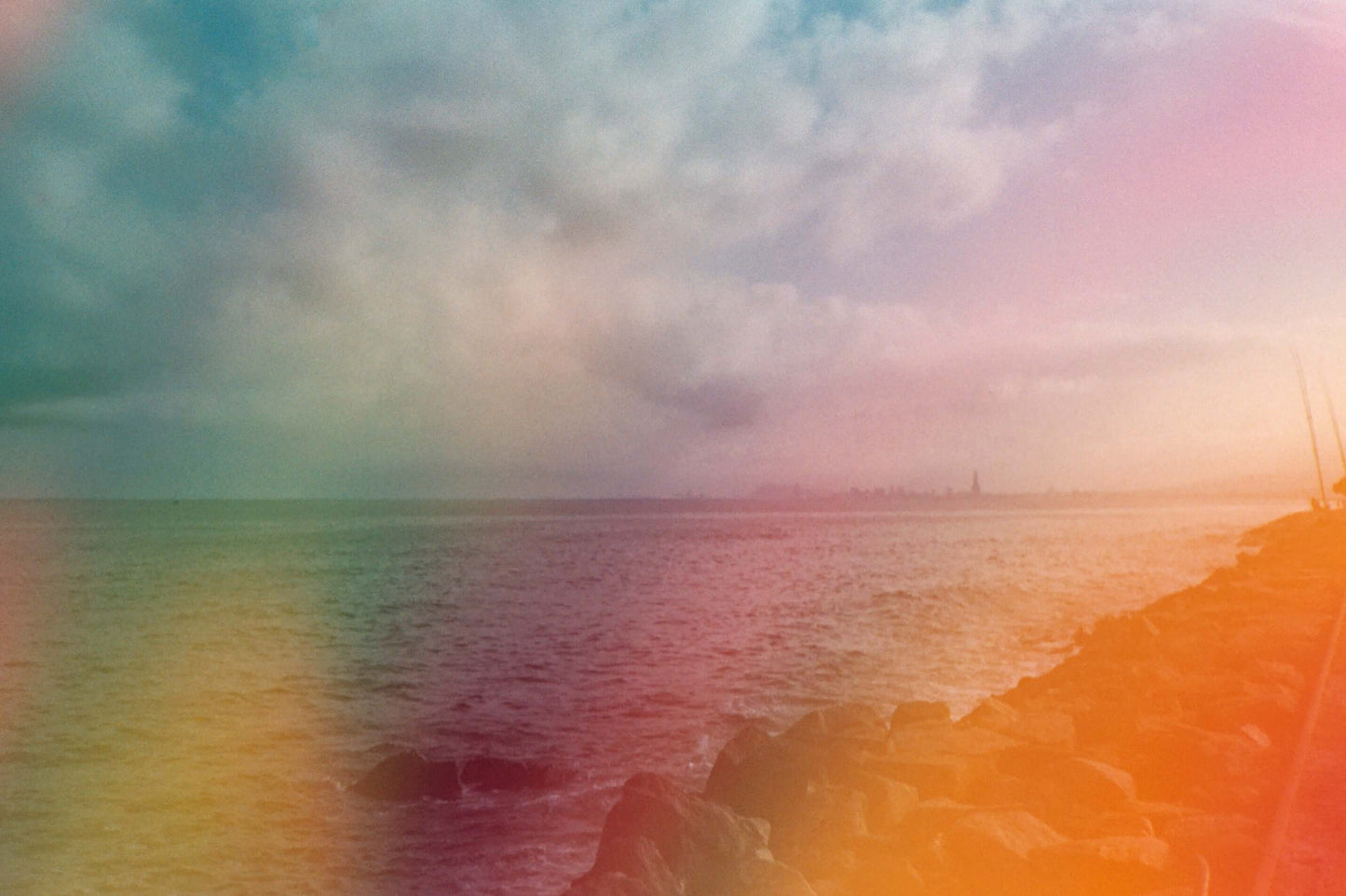 Dubblefilm Jelly 200 sample image with multicolored gradient tint over seascape with unique tones