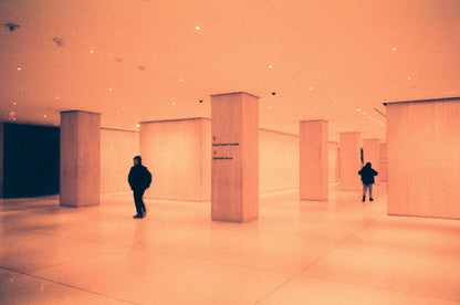 Harman Red 125 captures an empty modern hallway with warm tones.