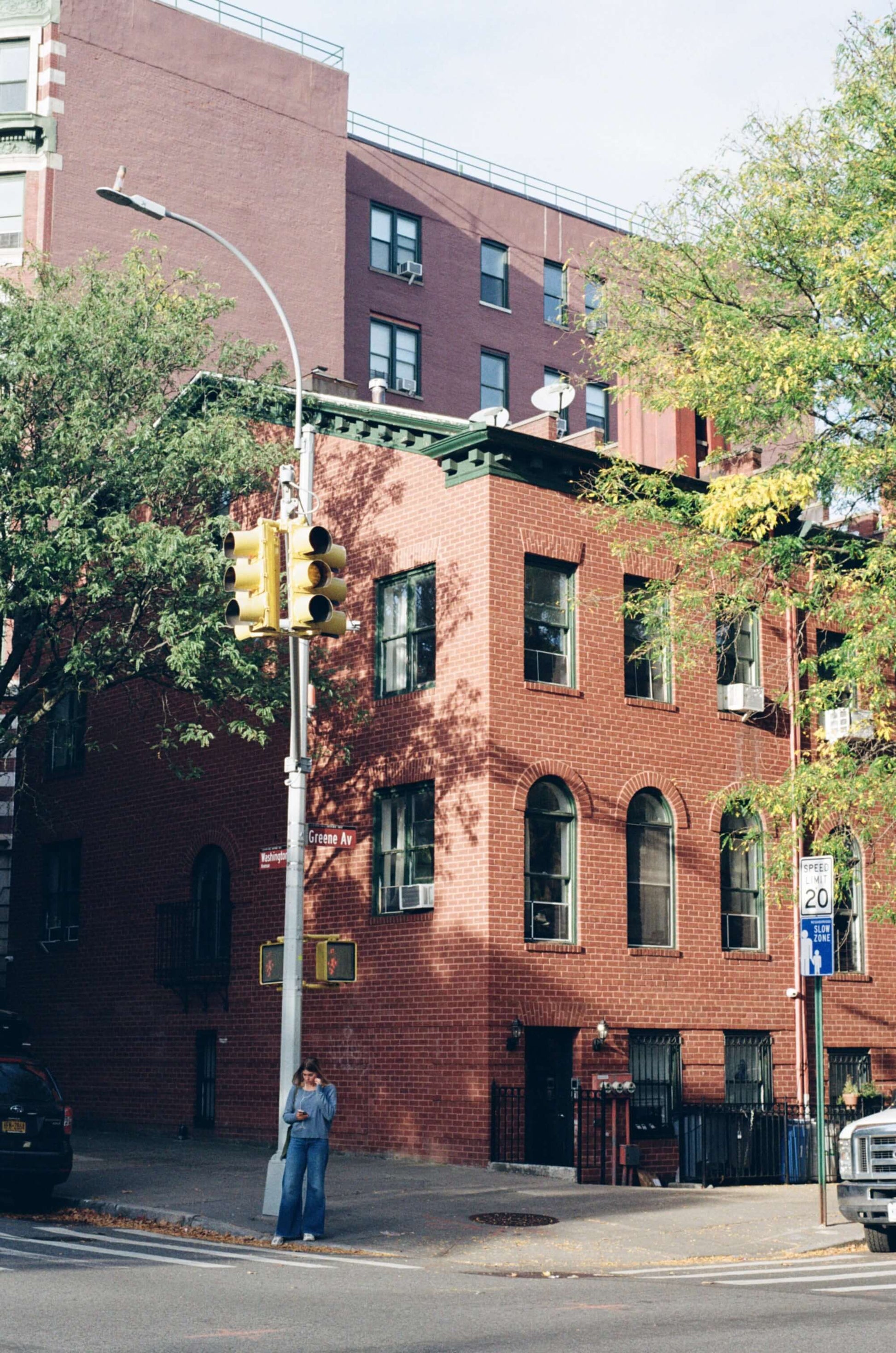 Street corner featuring a brick building captured with Kodak Kodacolor 200 Color Negative Film (35mm, 36 Exposures).