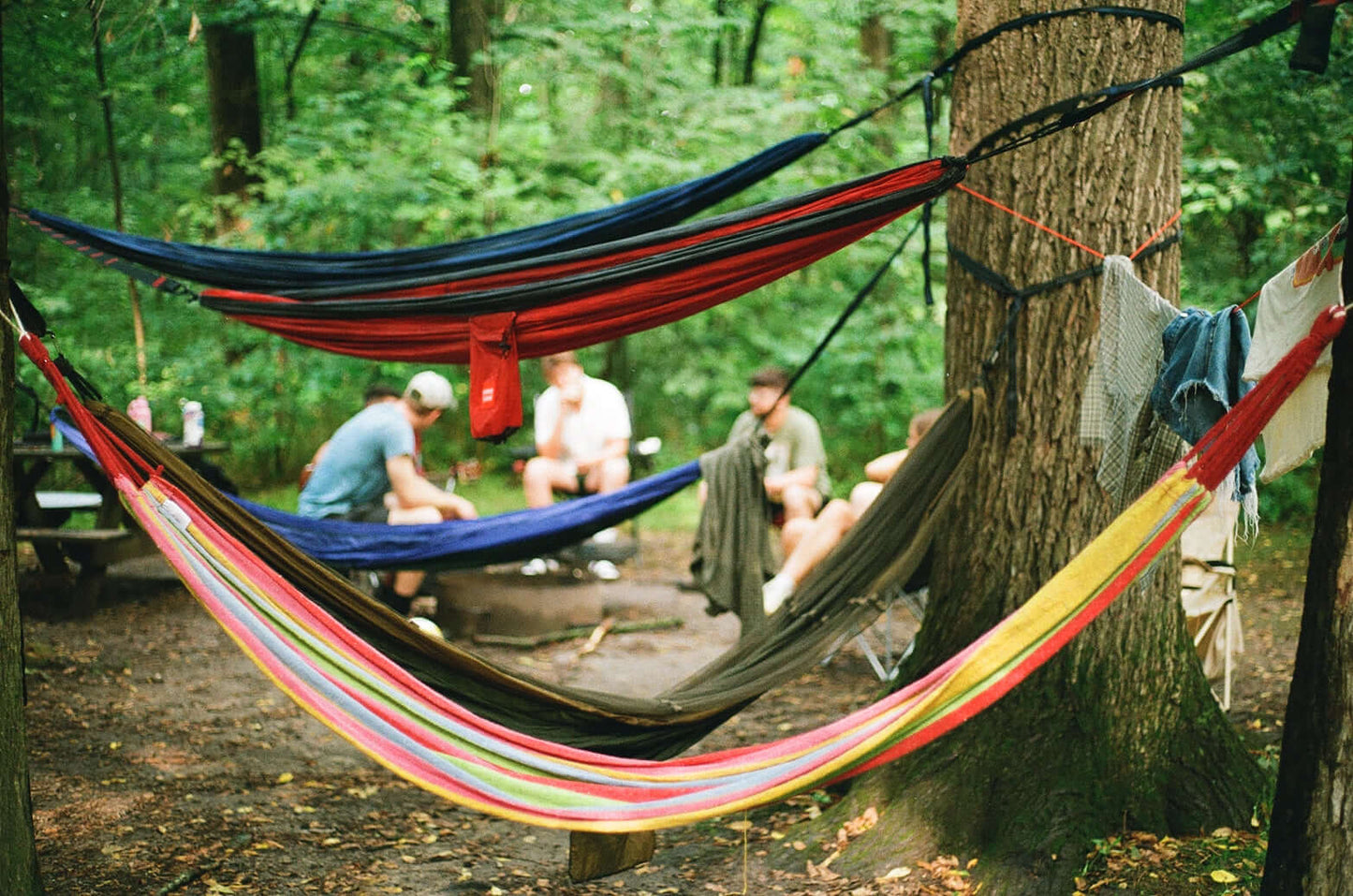 Kodak UltraMax 400 Color Negative (35mm, 24 Exposures 3-Pack) in outdoor camping setting with hanging hammocks.
