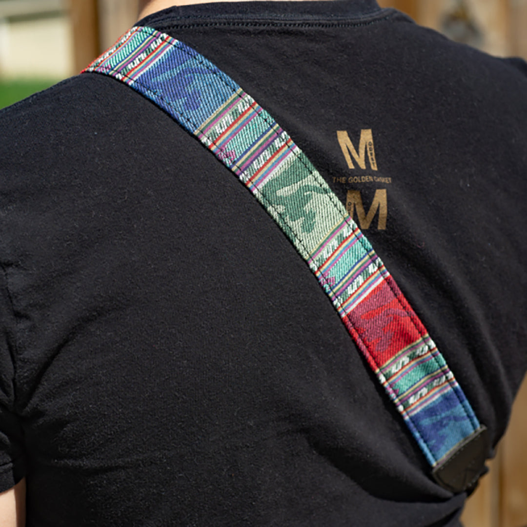 Flic Film Retro Style Camera Strap in colorful design worn on the shoulder of a person.