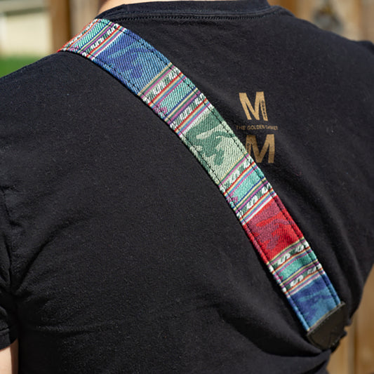 Flic Film Retro Style Camera Strap in colorful design worn on the shoulder of a person.