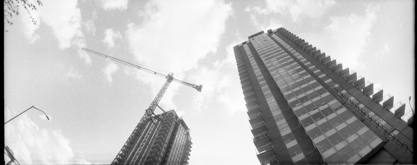 Flic Film UltraPan 400 Black and White Negative Film (35mm Roll, 36 Exposures) captures a city skyline.