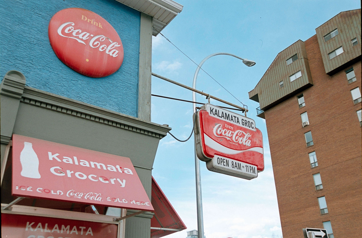 Flic Film Elektra 100 Color Negative Film (35mm Roll, 36 Exposures) used to capture a colorful grocery store sign.