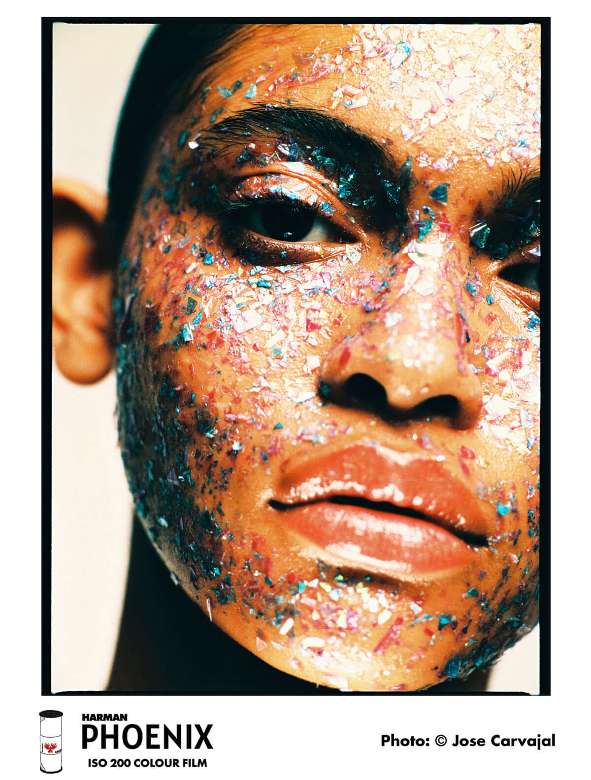 Close-up of a face with colorful fragments, showcasing results from Harman Phoenix 200 Color Negative Film (120 Roll Film).