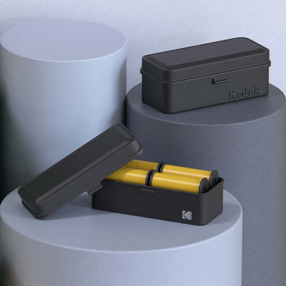 Kodak 120/135 Film Case (Black) showing opened case with film rolls on display.
