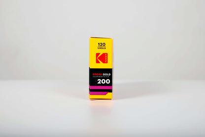 Kodak Eastman Gold 200 Color Negative Film (120 Roll) packaging displayed on a plain background.