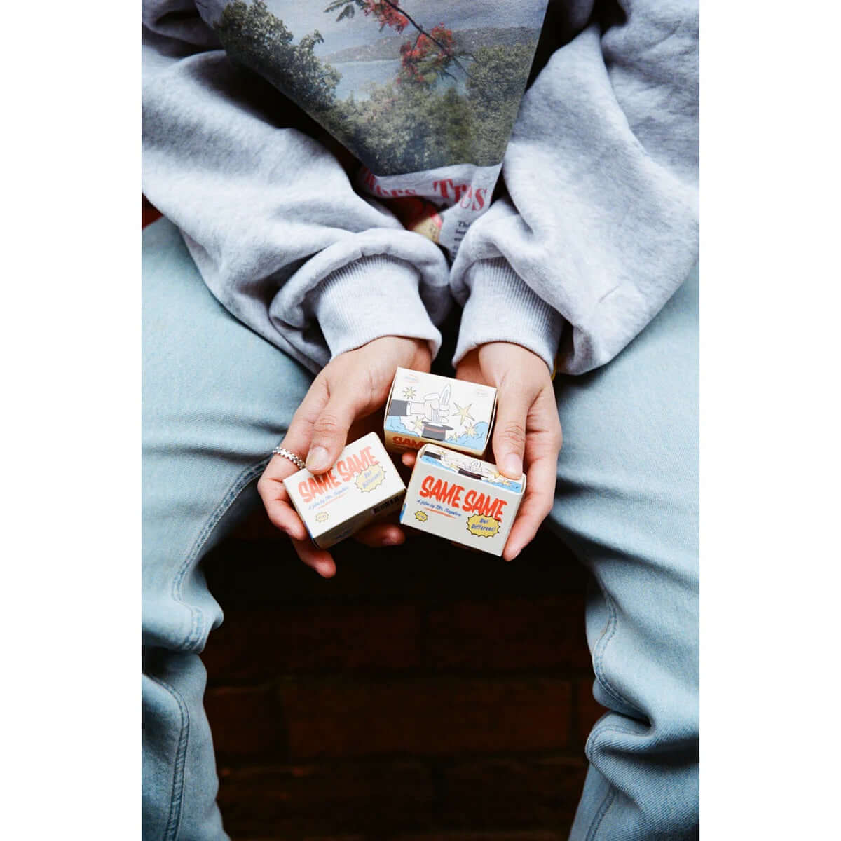 Person holding three boxes of Mr Negative Same Same But Different 400 Color Negative Film (35mm Roll, 36 Exposures).