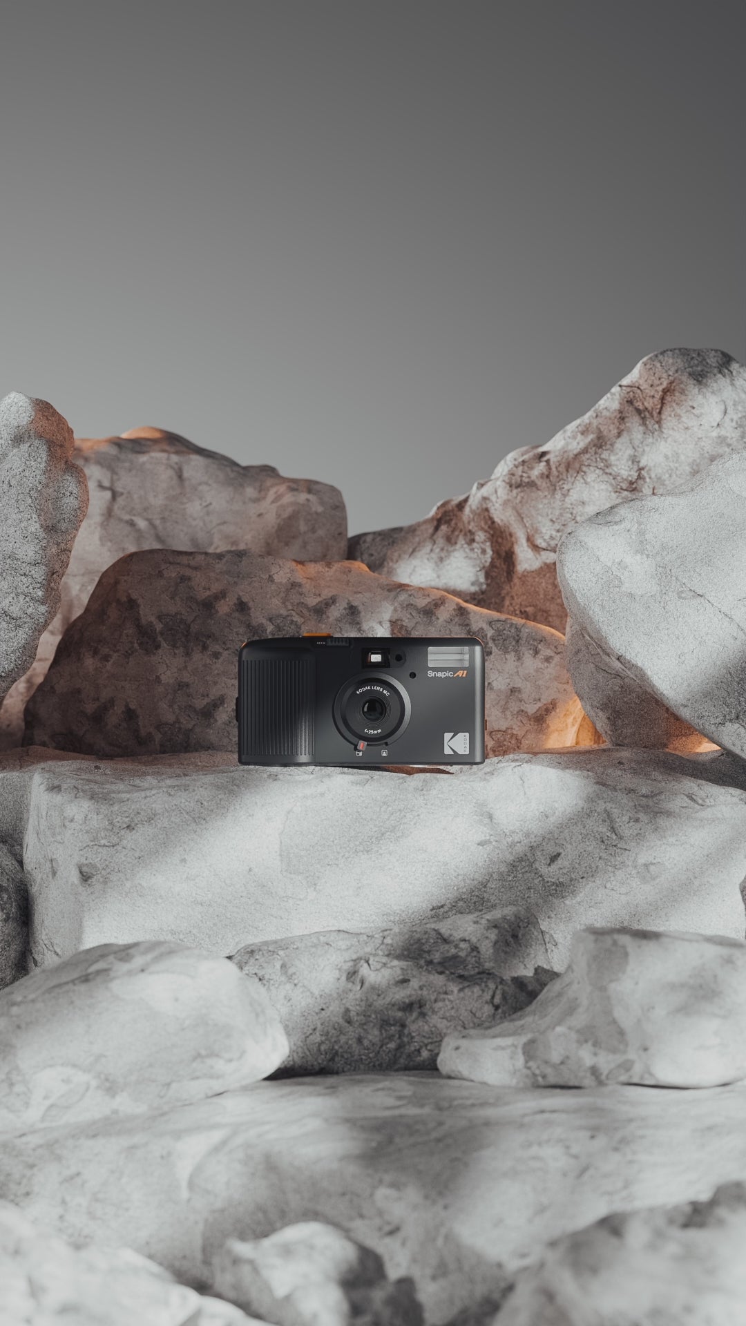 Video of the new Kodak Snapic A1 35mm camera sitting on a pile of rocks.