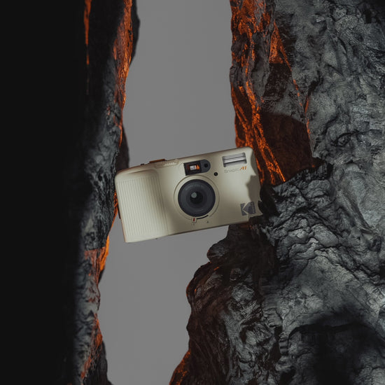 Video of the new Kodak Snapic A1 35mm camera floating between two pieces of rock.