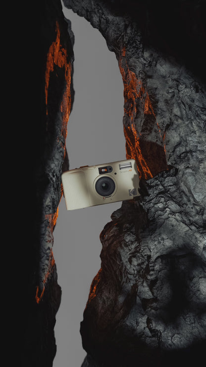 Video of the new Kodak Snapic A1 35mm camera floating between two pieces of rock.