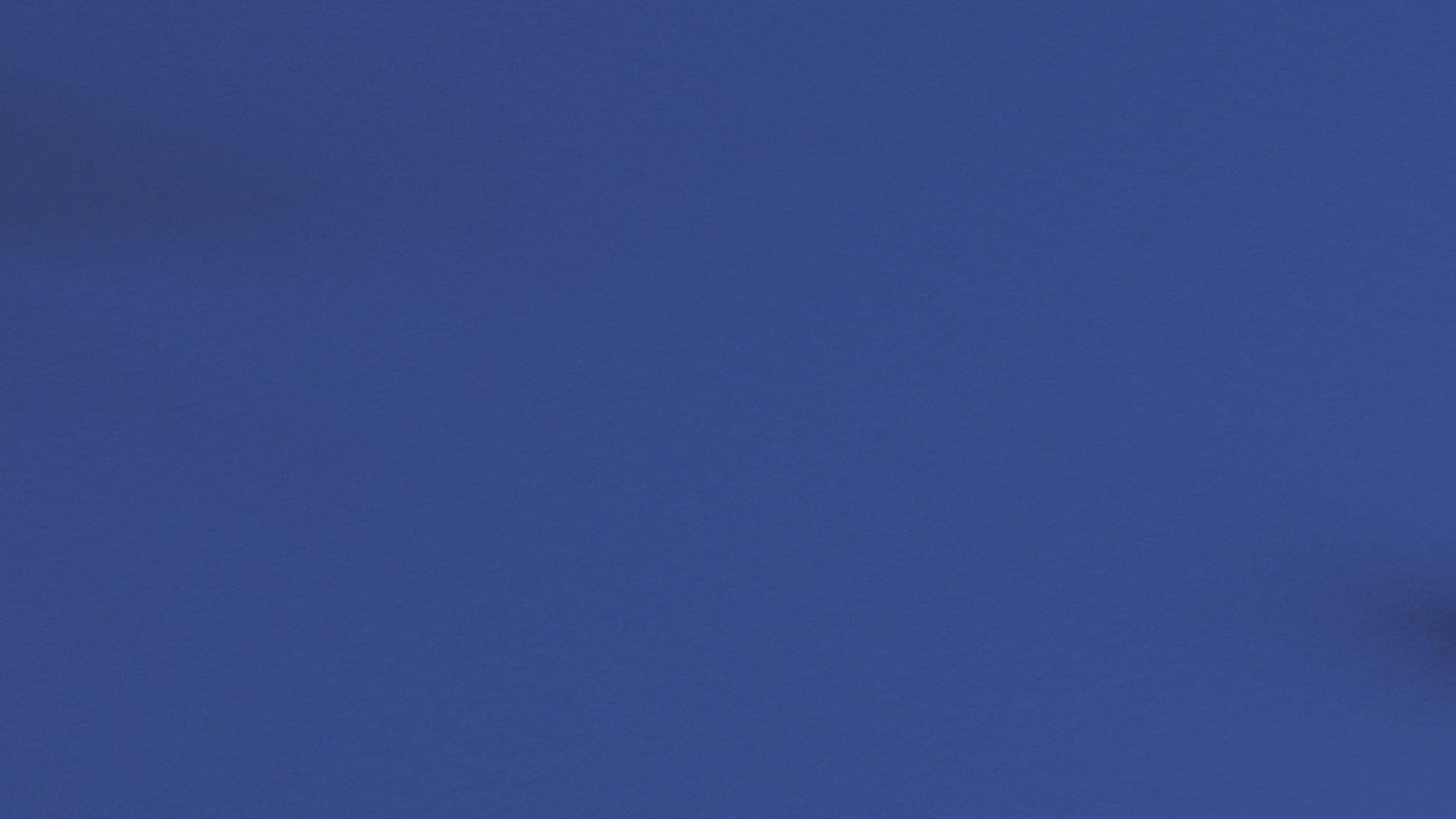 Background texture in deep blue, suitable for use as a backdrop or design element.