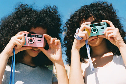 Dubblefilm SHOW 35mm Reusable Camera (Pink) — built-in flash, portable with case and strap for on-the-go photography